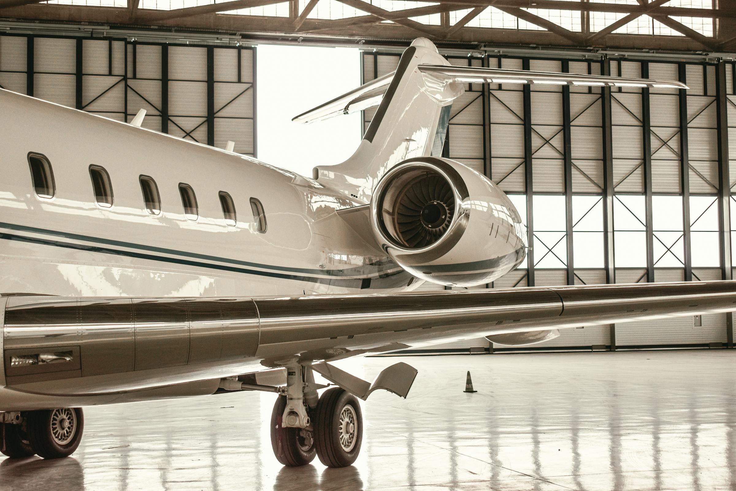 Close-up of a private jet in a hangar